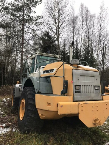 Фронтальный погрузчик Liebherr L564 с вилочным захватом продажа