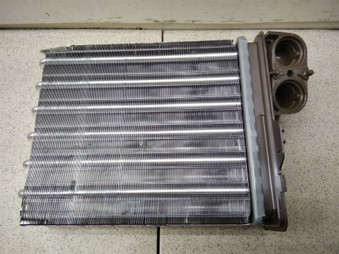 Радиатор отопителя Renault Sandero 2014- (УТ000197182) Оригинальный номер 6001547484